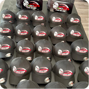Production of branded embroidered caps